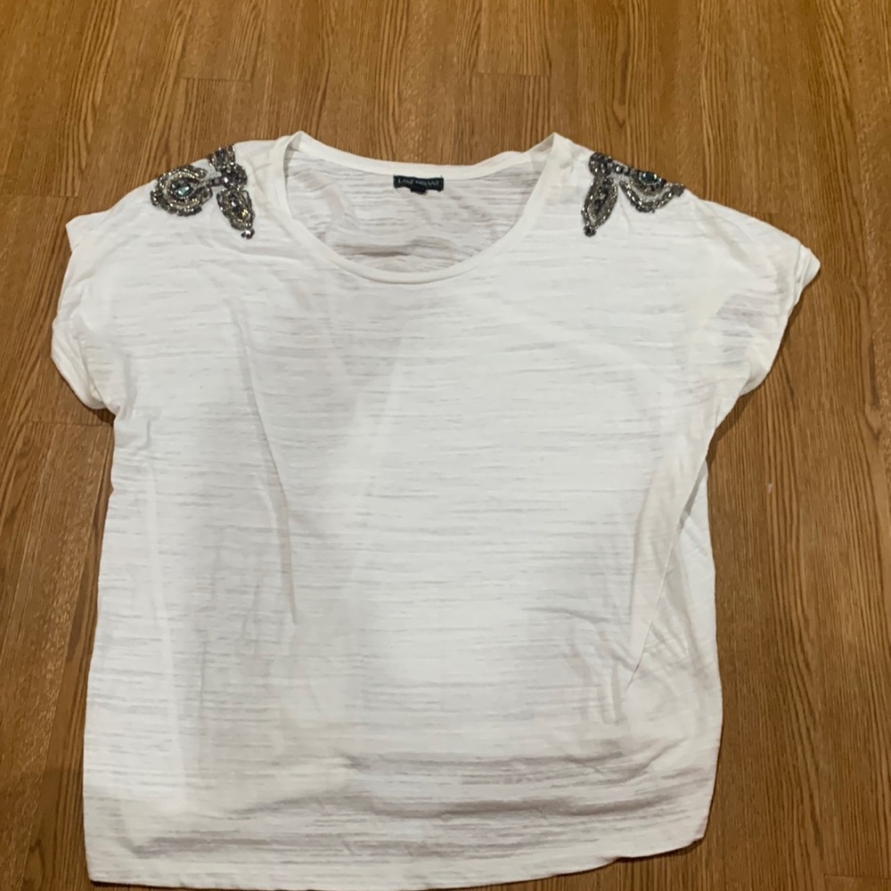 Top with stone embellishing on the shoulders
